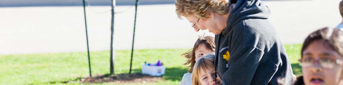 Primary Division Executive Principal with children