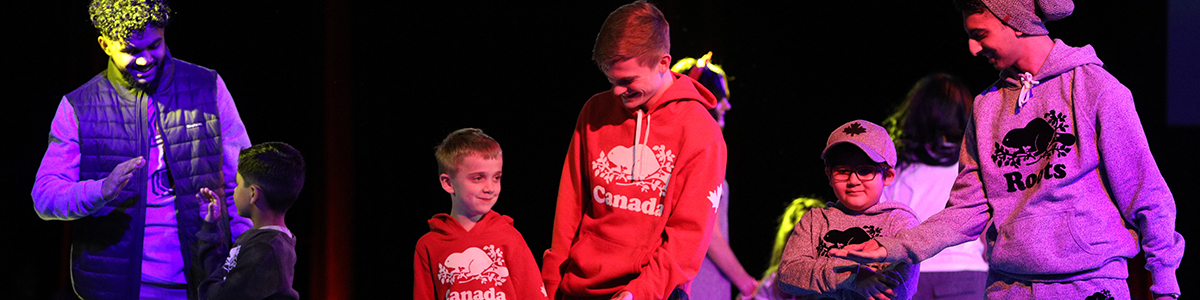 High School and Primary Division boys on stage at annual charity Fashion Show