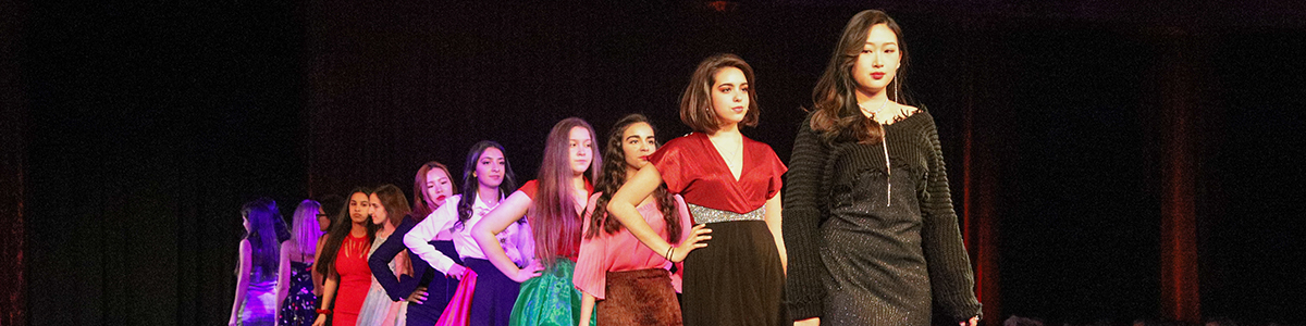 High School Division girls on stage at annual charity Fashion Show