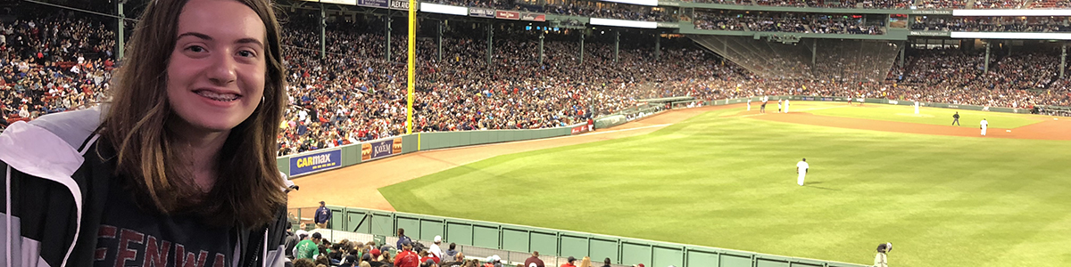 Girl on Grade 8 trip - at Fenway park in Boston